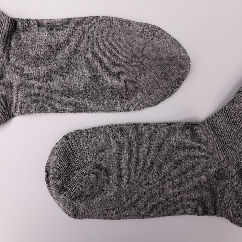 Blødt spundet silke nylon omviklet spandex imiteret 3D-printet jacquard håndsyet efterår og vinter herrestrømper WSD2850